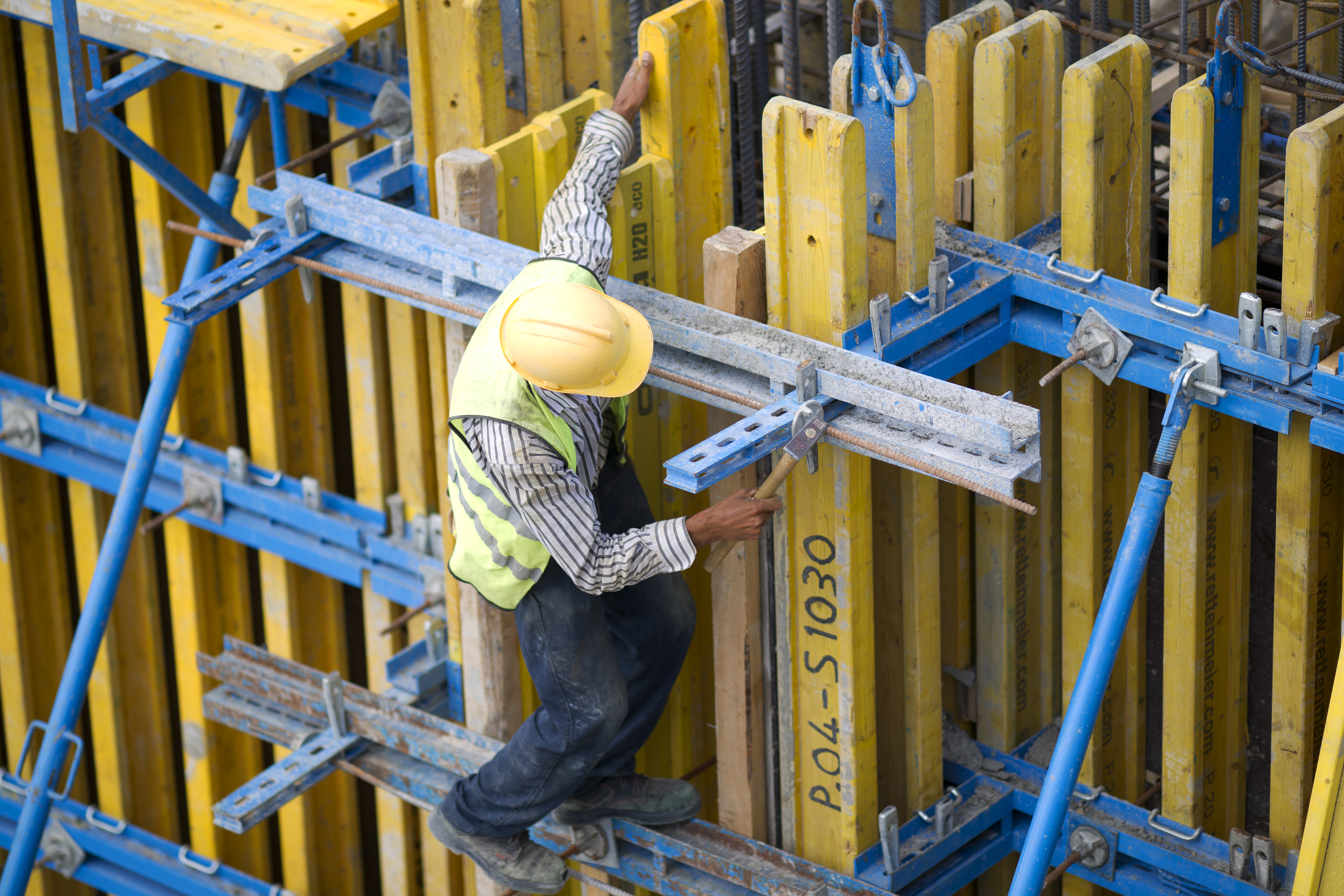 Engineers working on structural drawings
